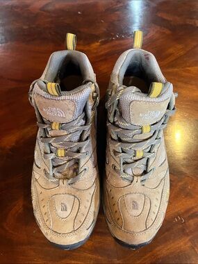 The North Face women’s size 8 1/2 beige, yellow and gray hiking boots